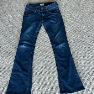 Women’s boot cut low rise Hudson jeans.